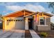 Charming single-Gathering home featuring a 2-car garage and cozy front porch, and American flag at 14481 W Via Del Oro --, Surprise, AZ 85379
