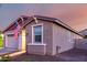 Charming single-Gathering home featuring a 2-car garage and cozy front porch, and American flag at 14481 W Via Del Oro --, Surprise, AZ 85379