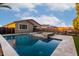 Backyard swimming pool with spa and patio area, ideal for outdoor entertaining and leisure at 14481 W Via Del Oro --, Surprise, AZ 85379