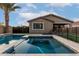 Inviting backyard pool with a spa and sun loungers, perfect for relaxing and soaking up the sun at 14481 W Via Del Oro --, Surprise, AZ 85379