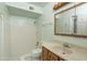Bathroom featuring a single vanity and a tiled shower at 1541 E Glencove St, Mesa, AZ 85203