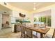 Bright breakfast nook featuring a view of the pool and easy access to the kitchen at 1541 E Glencove St, Mesa, AZ 85203