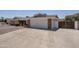 Home featuring brick accents and a spacious concrete driveway leading to the garage at 1541 E Glencove St, Mesa, AZ 85203