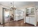 Dining area featuring a decorative chandelier and access to a private patio at 156 Leisure World --, Mesa, AZ 85206