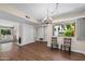 Spacious living room featuring a fireplace, hardwood floors, and natural light at 156 Leisure World --, Mesa, AZ 85206