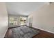 Living room showcasing wood flooring, ample natural light, and a cozy atmosphere at 156 Leisure World --, Mesa, AZ 85206