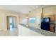 Updated kitchen features stainless steel appliances, granite counters, and a breakfast bar at 1630 W Pecan Rd, Phoenix, AZ 85041