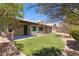 Scenic backyard showcasing lush artificial turf, patio and pergola at 16417 S 43Rd Pl, Phoenix, AZ 85048