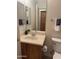 Cozy bathroom featuring a vanity, mirror, toilet, and towel rack at 18650 N 91St Ave # 1501, Peoria, AZ 85382