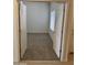 Bedroom featuring French doors, carpet flooring and natural light at 18650 N 91St Ave # 1501, Peoria, AZ 85382