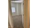 Empty bedroom with neutral carpet and view of a window with blinds at 18650 N 91St Ave # 1501, Peoria, AZ 85382