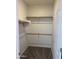 Walk-in closet with shelving and carpet flooring at 18650 N 91St Ave # 1501, Peoria, AZ 85382
