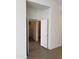 Hallway features doors to closets and ample storage space at 18650 N 91St Ave # 1501, Peoria, AZ 85382