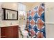 Bathroom featuring vanity, mirror, toilet and shower at 18669 W Vista Norte St, Goodyear, AZ 85338