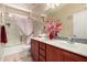 Bathroom featuring vanity, mirror and shower at 18669 W Vista Norte St, Goodyear, AZ 85338