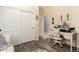Bedroom featuring closet, desk and carpeted floor at 18669 W Vista Norte St, Goodyear, AZ 85338