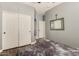 Bedroom with closet, mirror, and ensuite door at 18669 W Vista Norte St, Goodyear, AZ 85338