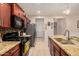 Features a spacious layout, granite counters, and stainless-steel appliances at 18669 W Vista Norte St, Goodyear, AZ 85338