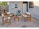 Charming backyard patio with an outdoor grill, a seating arrangement, and a wooden table, great for outdoor entertaining at 217 E Bruce Ave, Gilbert, AZ 85234