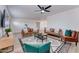 Bright living room with comfortable seating, contemporary decor, and a geometric area rug at 217 E Bruce Ave, Gilbert, AZ 85234