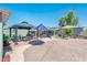 Spacious backyard featuring a pergola, patio area, and ample open space at 2221 W Mitchell Dr, Phoenix, AZ 85015