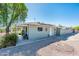 Charming single-story home featuring a covered porch and decorative accents at 2221 W Mitchell Dr, Phoenix, AZ 85015