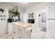 Eat-in kitchen features island, stainless appliances and lots of storage space at 2221 W Mitchell Dr, Phoenix, AZ 85015
