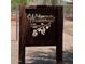 A decorative 'Welcome to Westwood' sign featuring artistic olive branches, creating a warm and inviting community entrance at 2221 W Mitchell Dr, Phoenix, AZ 85015