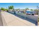 Large yard with RV and alley access offers ample parking and storage opportunities at 2221 W Mitchell Dr, Phoenix, AZ 85015