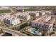 Condo complex with lake, community pool, landscaped courtyards, and convenient access to area amenities at 2511 W Queen Creek Rd # 166, Chandler, AZ 85248