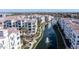 Elegant condo complex with landscaped lake, fountains, walkways, and convenient community features at 2511 W Queen Creek Rd # 166, Chandler, AZ 85248