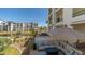 Comfortable balcony with views of the beautifully landscaped grounds and nearby lake at 2511 W Queen Creek Rd # 166, Chandler, AZ 85248
