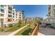An outdoor green space in a community with manicured landscaping and comfortable seating areas at 2511 W Queen Creek Rd # 166, Chandler, AZ 85248