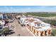 The stylish restaurant features orange curtains, an open-air dining area, and tasteful landscaping at 2511 W Queen Creek Rd # 166, Chandler, AZ 85248