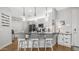 Bright, modern kitchen with stainless steel appliances and a breakfast bar with seating at 2511 W Queen Creek Rd # 166, Chandler, AZ 85248