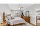 Inviting main bedroom featuring hardwood floors, natural light and ample space at 2511 W Queen Creek Rd # 166, Chandler, AZ 85248