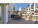 Spacious patio with an outdoor dining set and scenic views of the building and blue sky at 2511 W Queen Creek Rd # 166, Chandler, AZ 85248