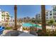 Stunning resort-style pool with ample seating and lush landscaping creating a perfect oasis within the community at 2511 W Queen Creek Rd # 166, Chandler, AZ 85248