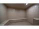 Tranquil sauna room with tiled walls, comfortable bench seating, and recessed lighting for relaxation at 2511 W Queen Creek Rd # 166, Chandler, AZ 85248