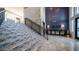 The Cays at Downtown Ocotillo lobby staircase with designer tile and wrought iron railing at 2511 W Queen Creek Rd # 166, Chandler, AZ 85248