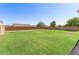 Large, well-maintained backyard featuring a spacious lawn perfect for outdoor enjoyment and relaxation at 259 E Montego Dr, Casa Grande, AZ 85122