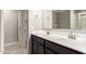 Bathroom featuring double sinks, vanity, and tile floors at 259 E Montego Dr, Casa Grande, AZ 85122