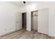 Bedroom with closet and an entry to the bathroom, creating a convenient and private space at 259 E Montego Dr, Casa Grande, AZ 85122