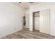 Bedroom with closet and an entry to the bathroom, creating a convenient and private space at 259 E Montego Dr, Casa Grande, AZ 85122