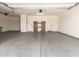 Spacious two-car garage with ample storage and shelving units for organization at 259 E Montego Dr, Casa Grande, AZ 85122