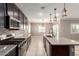 Modern kitchen features granite countertops, stainless steel appliances, and a spacious island at 259 E Montego Dr, Casa Grande, AZ 85122