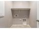 Laundry room featuring modern utility connections and ample storage space at 259 E Montego Dr, Casa Grande, AZ 85122