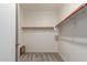 Walk-in closet with carpet and one high hanging rod and shelf at 259 E Montego Dr, Casa Grande, AZ 85122