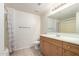 Bright bathroom with tile floor, single sink vanity and shower/tub combo at 295 N Rural Rd # 160, Chandler, AZ 85226