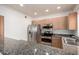 Well-appointed kitchen with stainless steel appliances, granite countertops, and functional layout at 295 N Rural Rd # 160, Chandler, AZ 85226